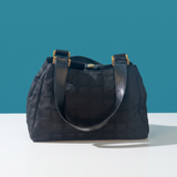 CHANEL TRAVEL CC LOGO WITH LEATHER HANDLES