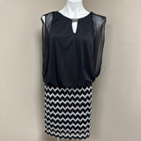 Black Dress with Sheer Sleeves and Zigzag Skirt